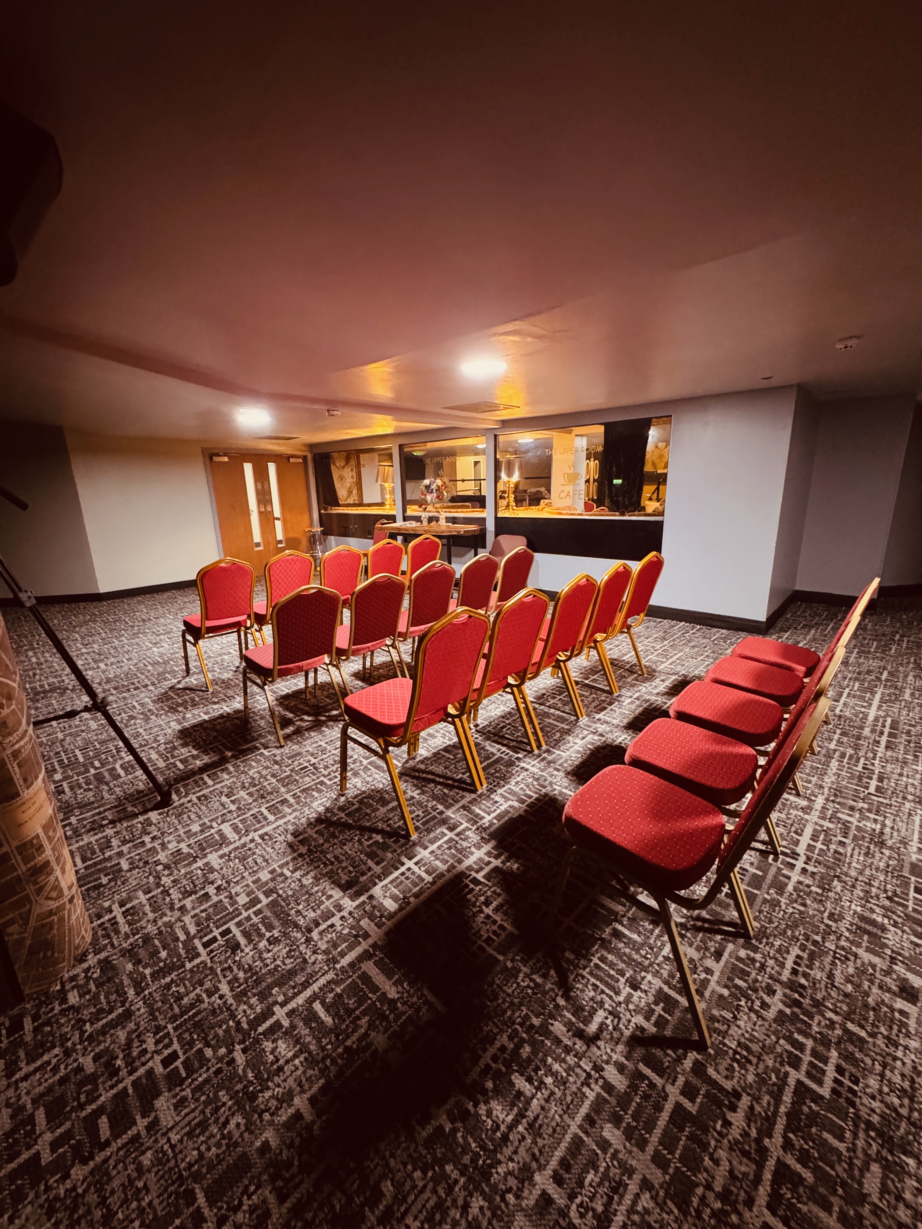 The Overflow event space with red chairs